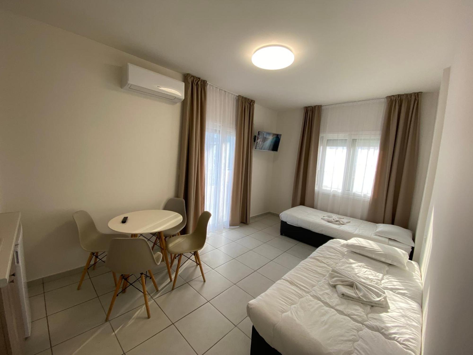 Opalium Beach Front Suites Потос Екстер'єр фото